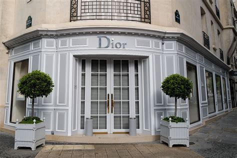 standing in front of dior store|dior's restaurant.